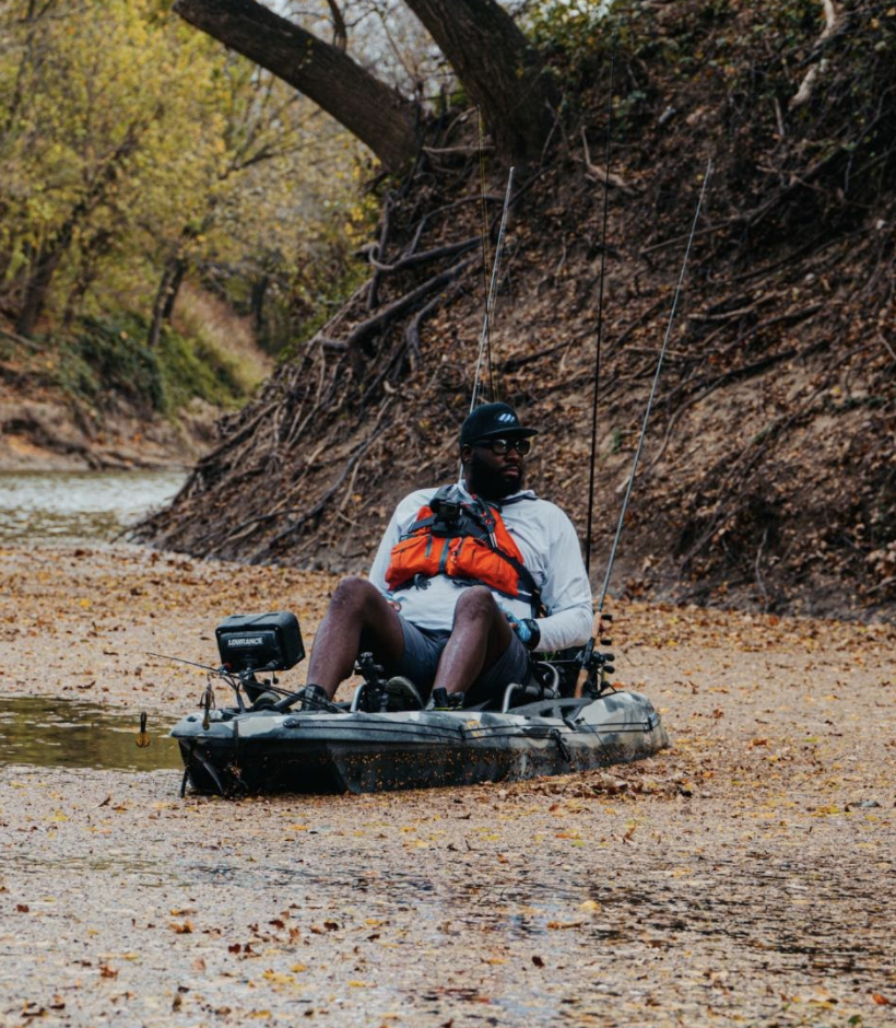 TBFD kayaking down a creek